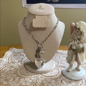 Elegant Silver tone Necklace with Decorative Pendant.